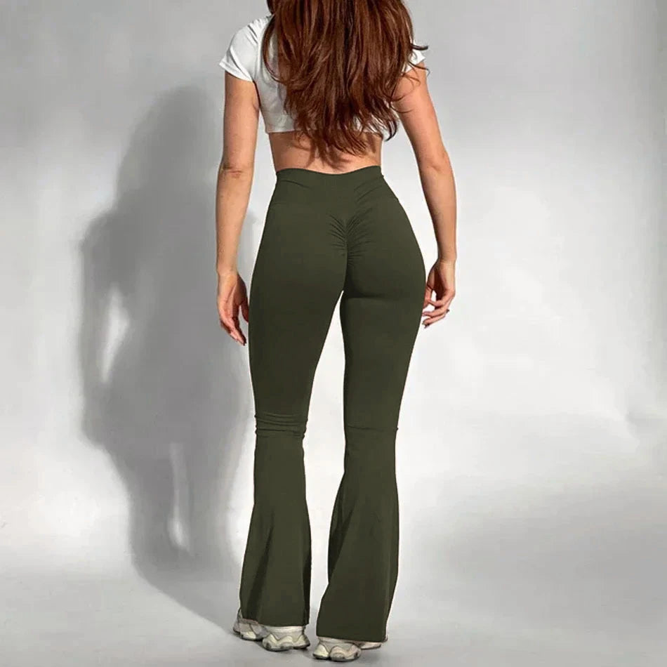 Stylish high-waisted sporty pants, perfect for workouts and daily wear.

بنطال رياضي عالي الخصر أنيق ومريح مثالي للتمارين والإطلالات اليومية.