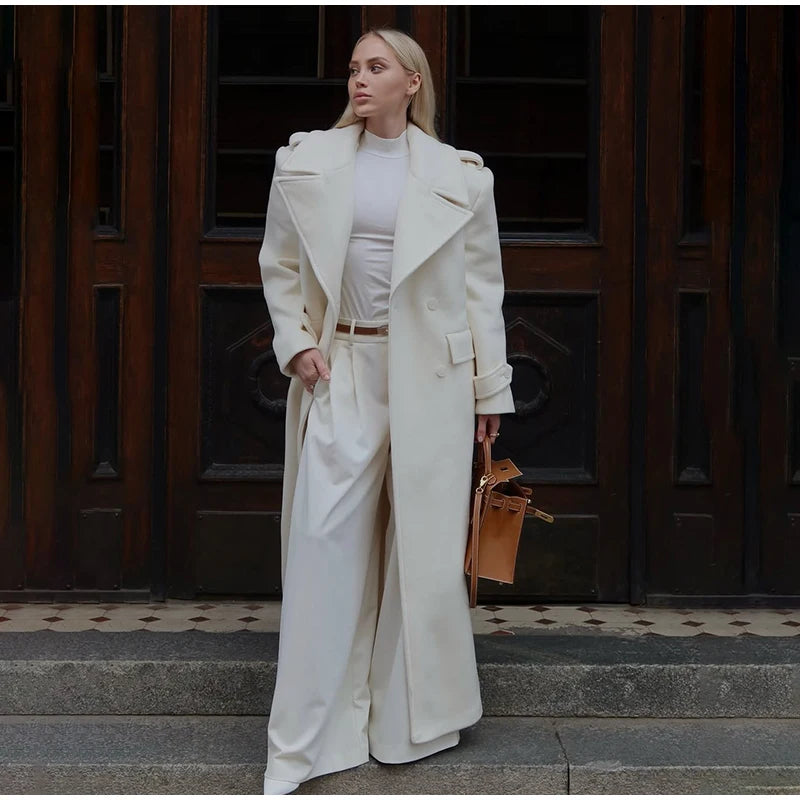 Women’s long wool overcoat with elegant design, stylish lace-up, and pockets — unmatched warmth and elegance for Autumn/Winter 2025.