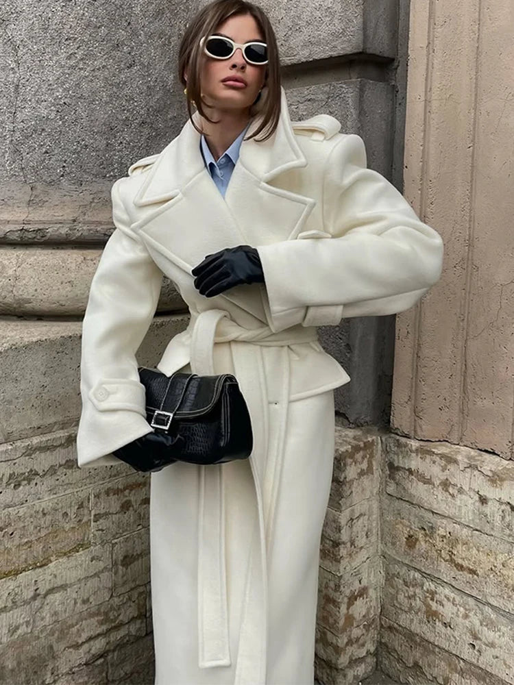 Women’s long wool overcoat with elegant design, stylish lace-up, and pockets — unmatched warmth and elegance for Autumn/Winter 2025.