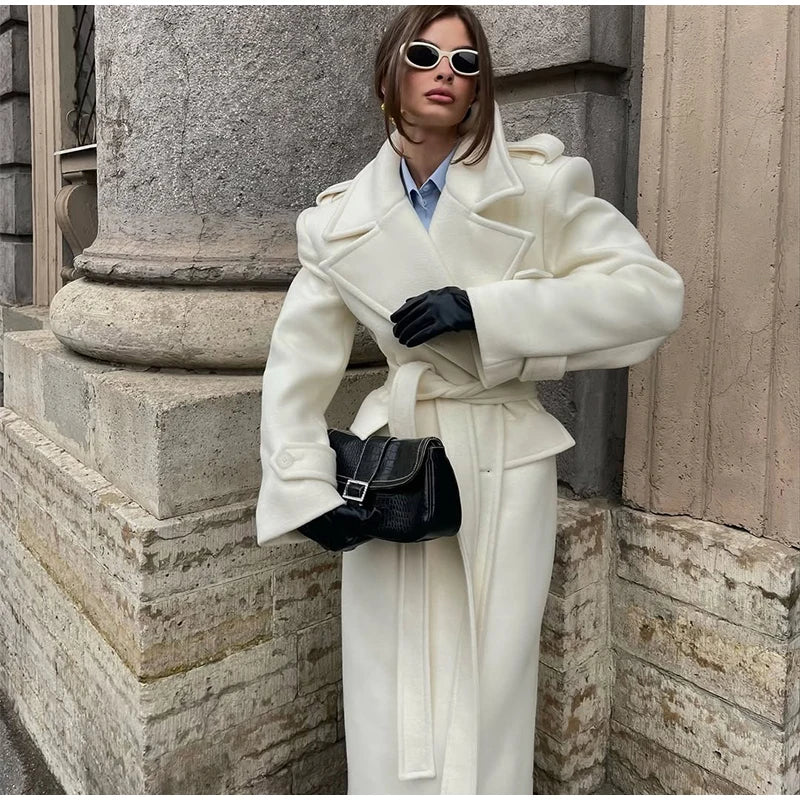 Women’s long wool overcoat with elegant design, stylish lace-up, and pockets — unmatched warmth and elegance for Autumn/Winter 2025.