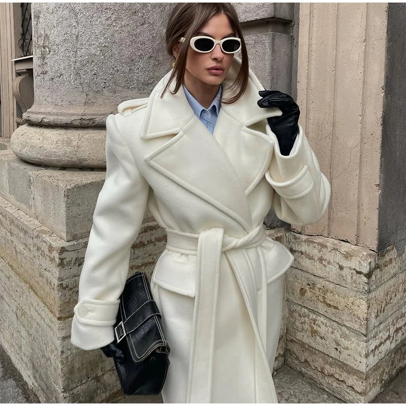 Women’s long wool overcoat with elegant design, stylish lace-up, and pockets — unmatched warmth and elegance for Autumn/Winter 2025.