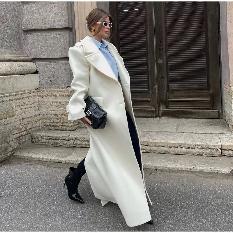 Women’s long wool overcoat with elegant design, stylish lace-up, and pockets — unmatched warmth and elegance for Autumn/Winter 2025.