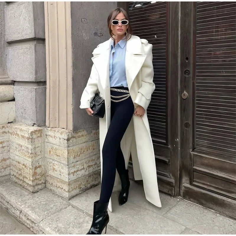 Women’s long wool overcoat with elegant design, stylish lace-up, and pockets — unmatched warmth and elegance for Autumn/Winter 2025.